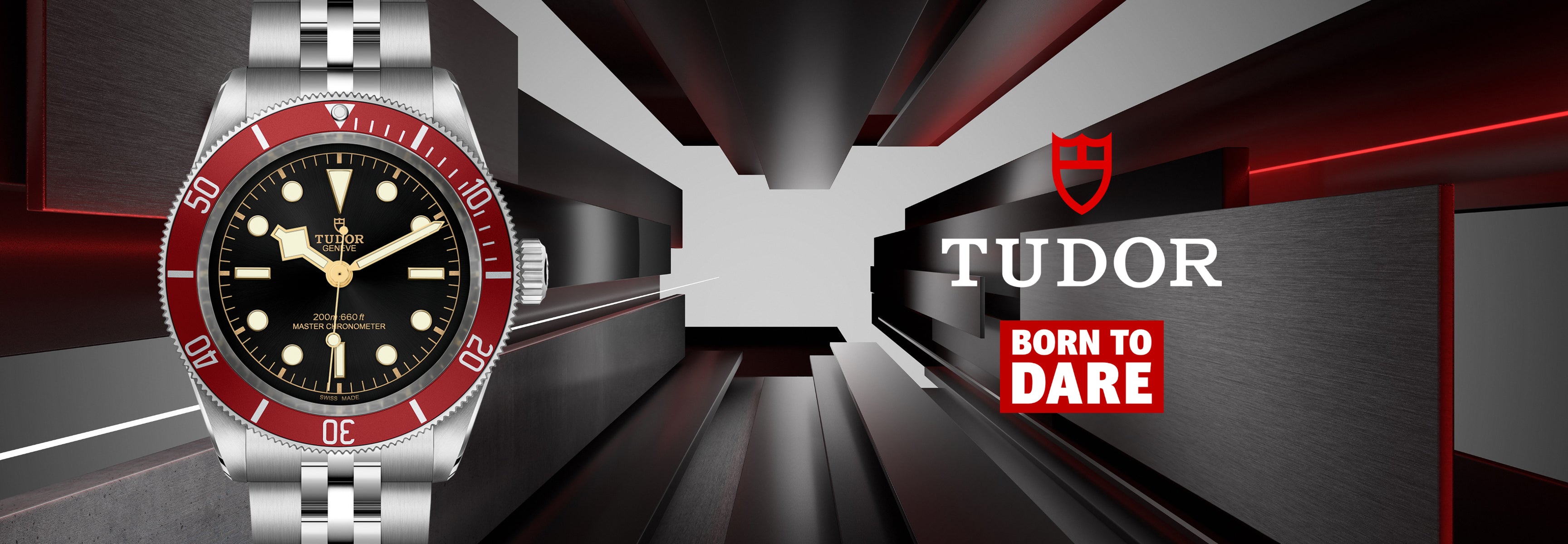 A banner photo of a Tudor watch with a black dial and red bezel against a dark background featuring the Tudor logo and 'Born to Dare' text on the right. A banner photo of a Tudor watch with a black dial and red bezel against a dark background featuring the Tudor logo and 'Born to Dare' text on the right.