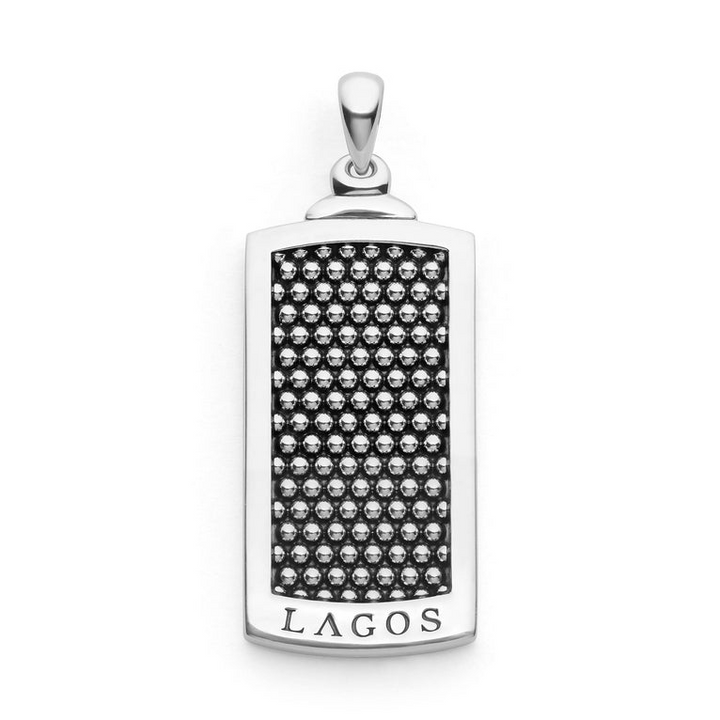 A LAGO rectangular amulet is displayed in the middle of a white background. The amulet features a sleek white gold border, LAGOS engraved at the bottom, and a caviar beaded design in the center.