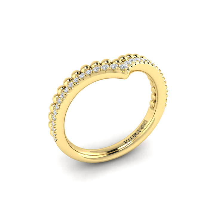 An angled view of a yellow gold ring is set against a white background. The ring features a V-shaped design with one row of accent diamonds and one row of beads.