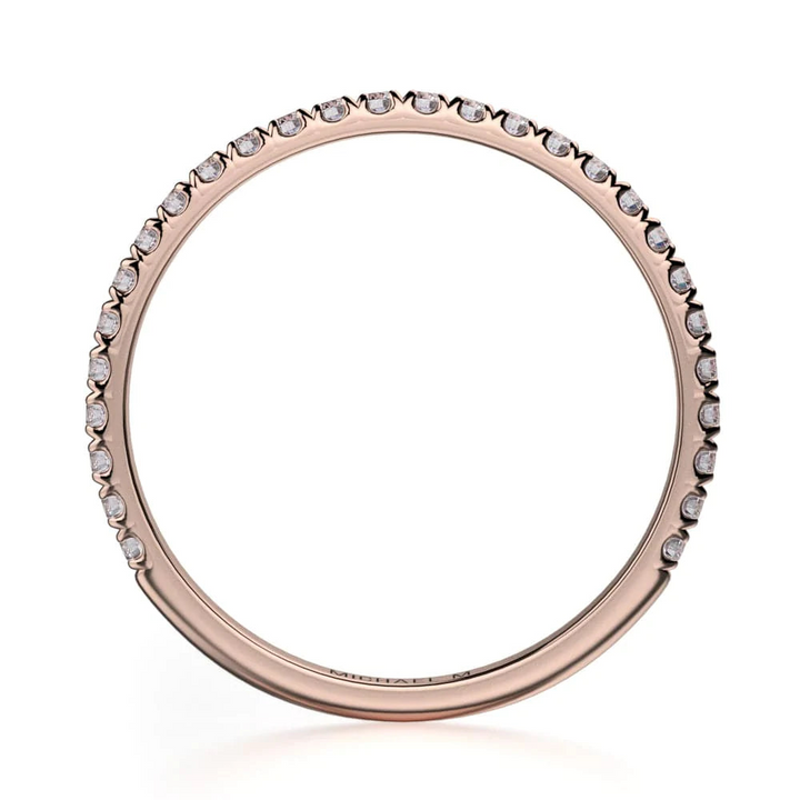 This is a side view of a rose gold ring showing the outside of the ring, and the rose gold band.