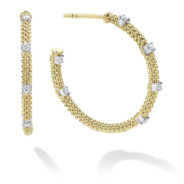 Hoop earrings with diamonds accented with 18k gold superfine Caviar beading. The right earring is angled.