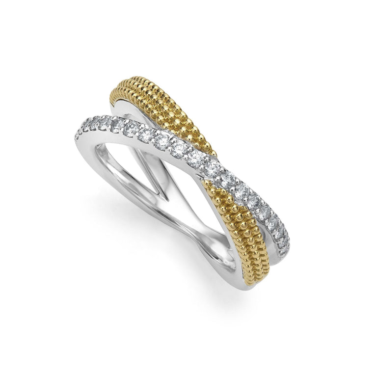 A Sterling Silver & 18K Gold ring in the middle of a white background, featuring an x motif and caviar beading