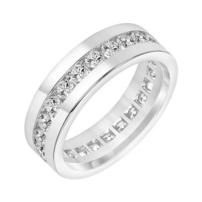 A white-gold ring is displayed to the left in the middle of a white background. The ring features a row of brilliant diamonds.