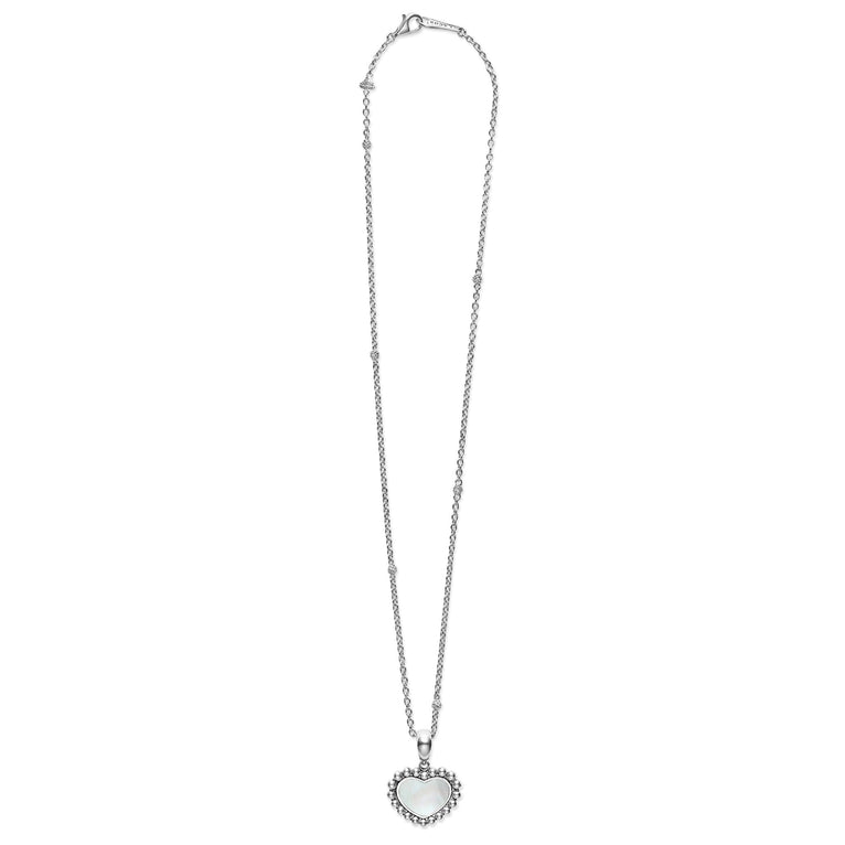 A sterling silver necklace featuring a heart-shaped mother of pearl gemstone pendant framed by sterling silver Caviar beading