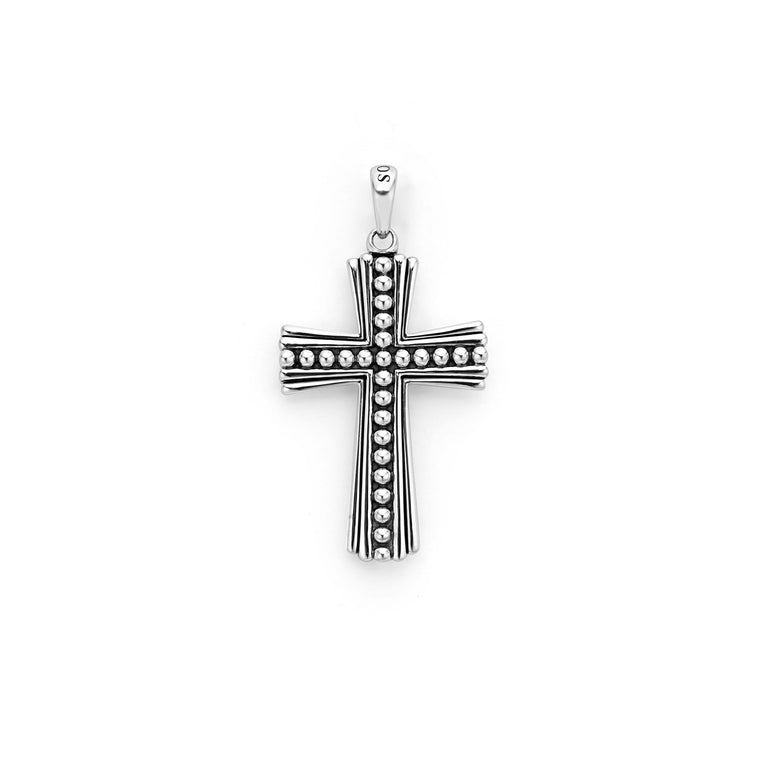 A Cross Amulet featuring Signature Caviar beads accentuated by highly polished sterling silver is displayed in the middle of a white background