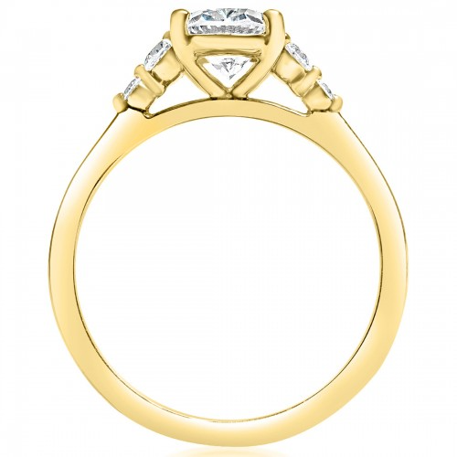 A side-view of the Fancy Five Stone Engagement Ring, made of yellow gold. The side view shows the diamond's pavilion and the yellow-gold band.