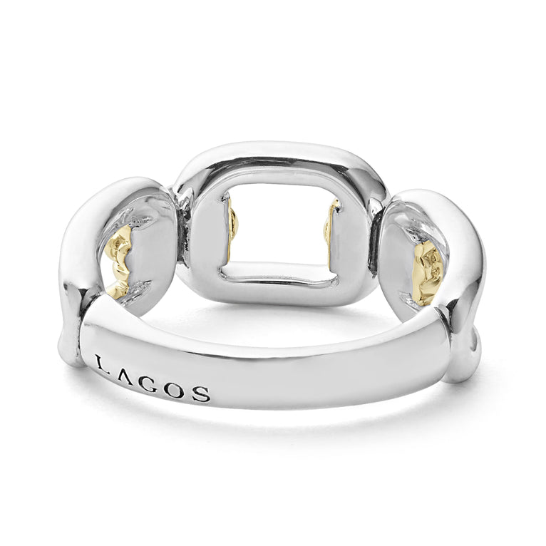 A back-view of a sterling silver and 18k gold ring displayed in the middle of a white background featuring Sterling silver and18k gold variations of Caviar beading and fluting elements