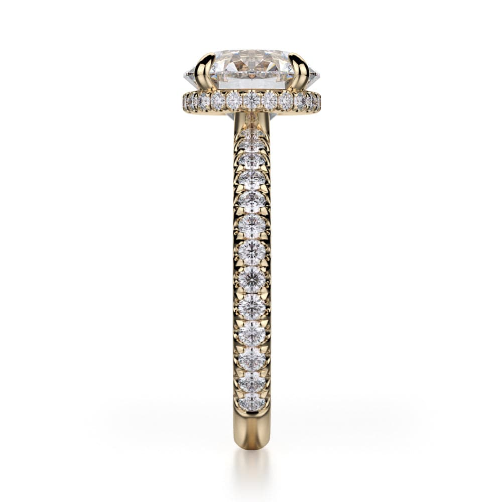 A side-view of the Hidden Halo Pave Engagement Ring, made of yellow gold. The side view shows the diamond's pavilion and the side of the gold band with diamonds.