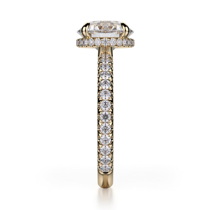 A side-view of the Hidden Halo Pave Engagement Ring, made of yellow gold. The side view shows the diamond's pavilion and the side of the gold band with diamonds.