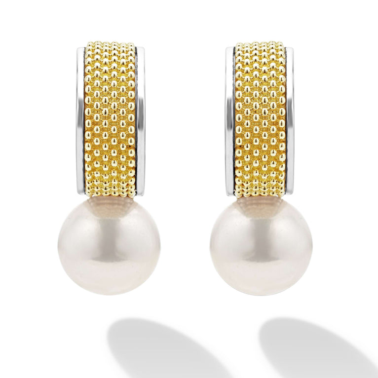 A pair of hoop earrings with 18K gold and sterling silver Caviar beading with pearl drop detailing. 