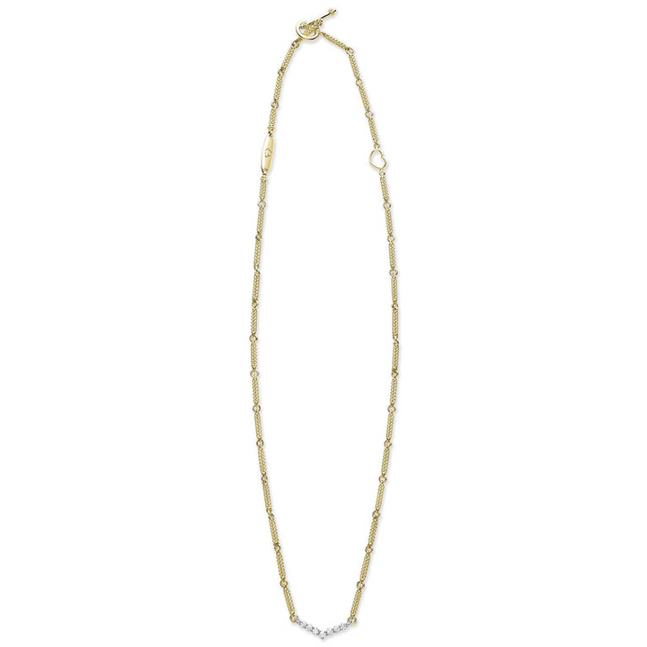 A18k gold necklace featuring caviar beading and a white gold chevron design against a white background and showing the clasp at the top against a white background.