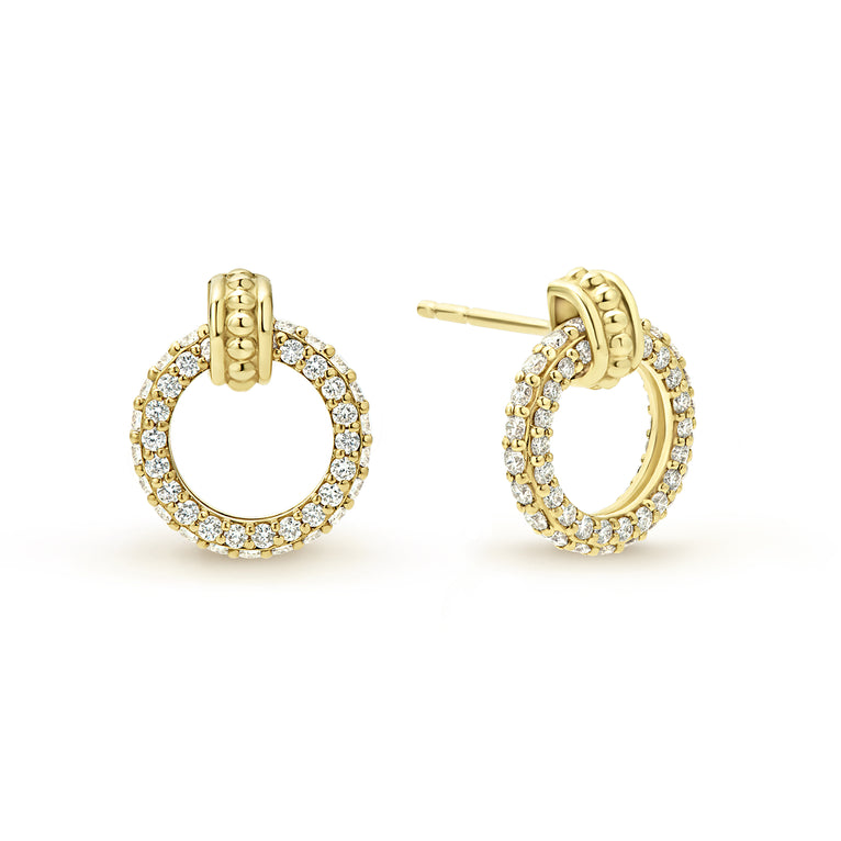 Diamond gold circle stud earrings with an 18k gold Caviar accent. The right earring is angled.