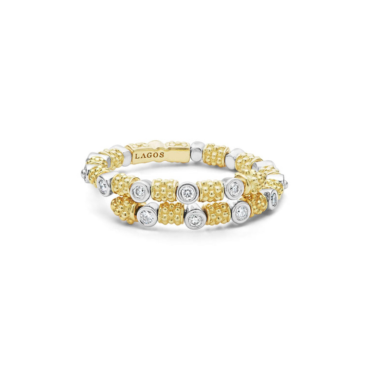 A front view of a yellow gold ring against a white background. The ring features 18k gold superfine Caviar beading, wrap design, and round diamond stations.