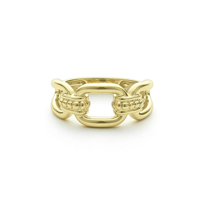 A front view of a yellow gold ring against a white background. The ring features 18K gold variations of Caviar beading and fluting elements, and an oval link design.