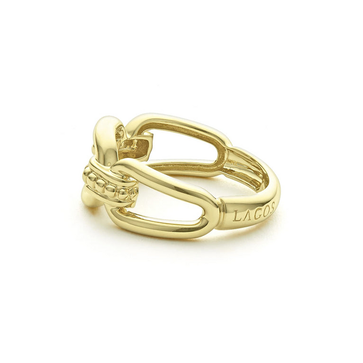 A side view of a yellow gold ring against a white background. The ring features 18K gold variations of Caviar beading and fluting elements, and an oval link design.
