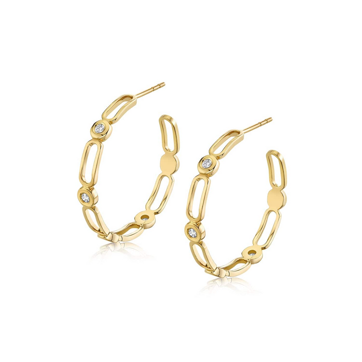 Two yellow-gold earrings are lying flat against a white background. The hoop earrings feature an alternating link and diamond-set bezel pattern.