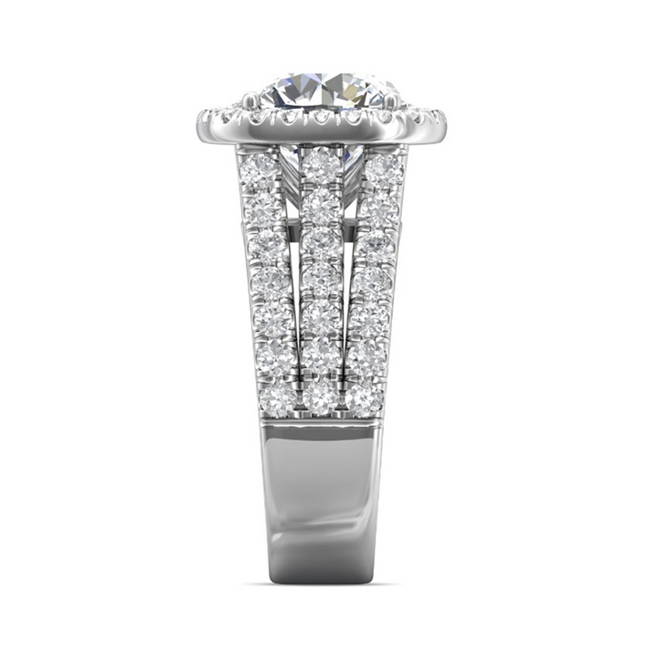 A side view of a ring made of white gold. The side view shows the diamond's pavilion and the white-gold band.