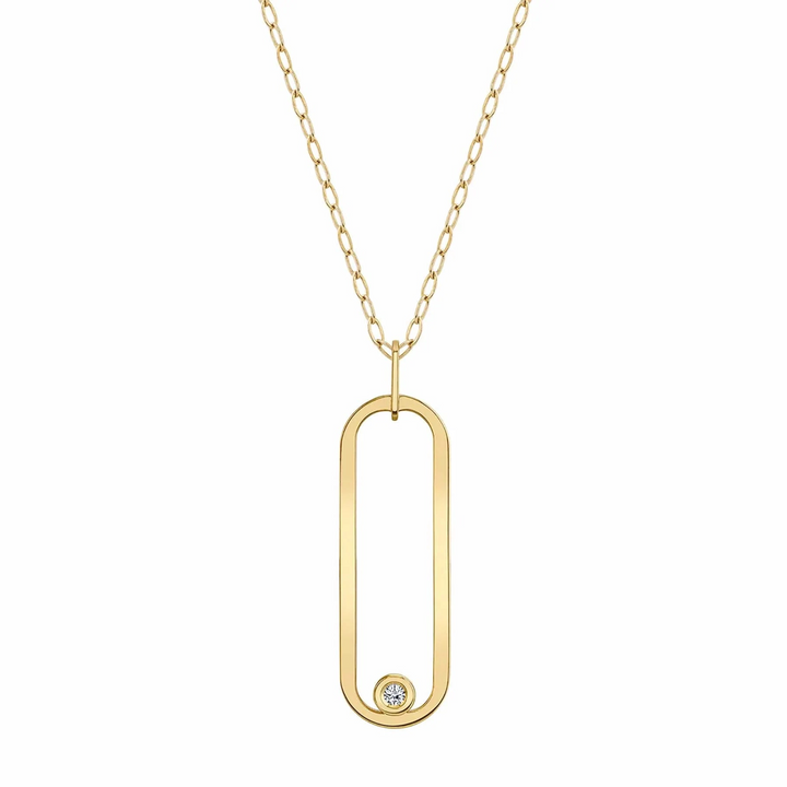 A yellow-gold necklace lying flat against a white background features a flat gold link with a bezel-set diamond.