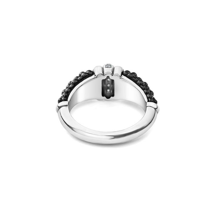 A back-view of a sterling silver ring is displayed on a white background featuring black ceramic caviar beading with a row of diamonds.