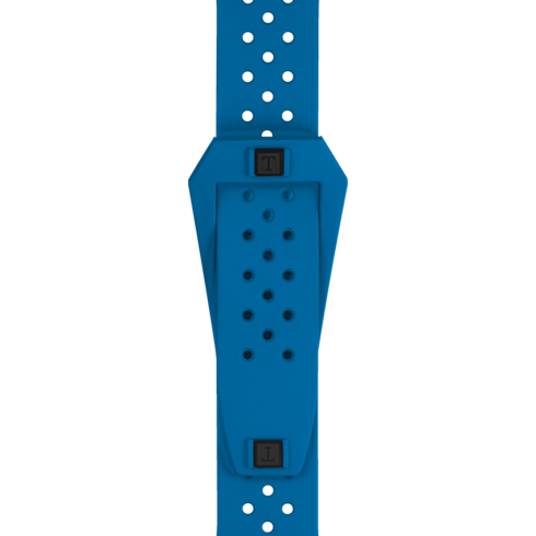 A close-up of the watch's blue rubber strap with the Tissot logo buckle in the middle against a transparent background