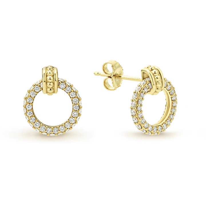 Diamond gold circle stud earrings with an 18k gold Caviar accent. The right earring is angled, showing the back.