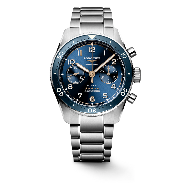 A Longines watch standing straight against a transparent background. The watch features a black & blue dial, white & gold hands and markers, a blue bezel, three crowns on the right side, and a stainless steel bracelet.