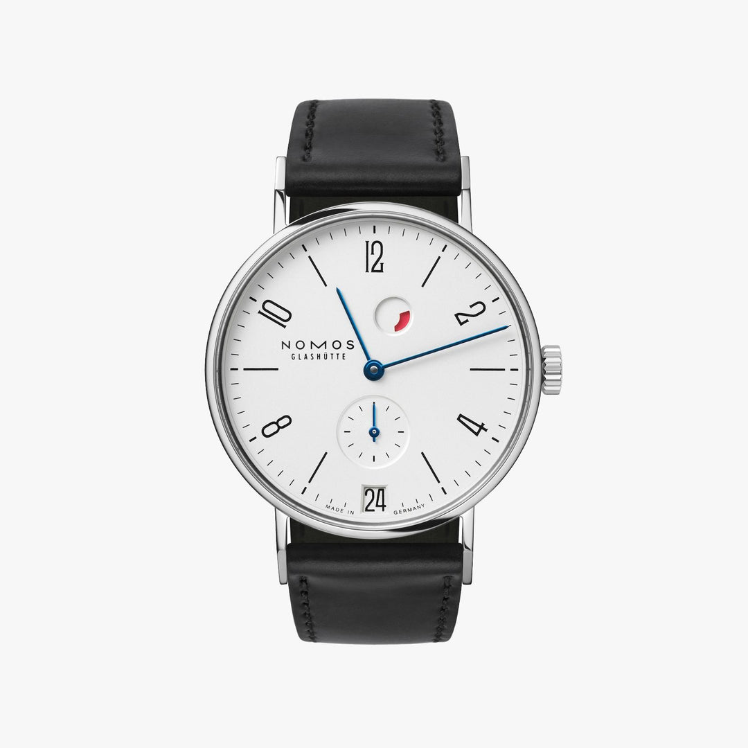 A Nomos Glashutte watch stands straight against a white background. It features a white dial, black & blue hands and markers, a stainless steel bezel, and a black leather strap.