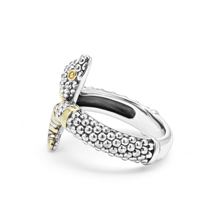 A sterling silver ring is displayed on a white background featuring a snake motif with Sterling silver Caviar beading highlighted by 18K gold stations