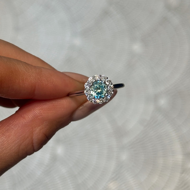 Blue Zircon and Diamond Halo Ring