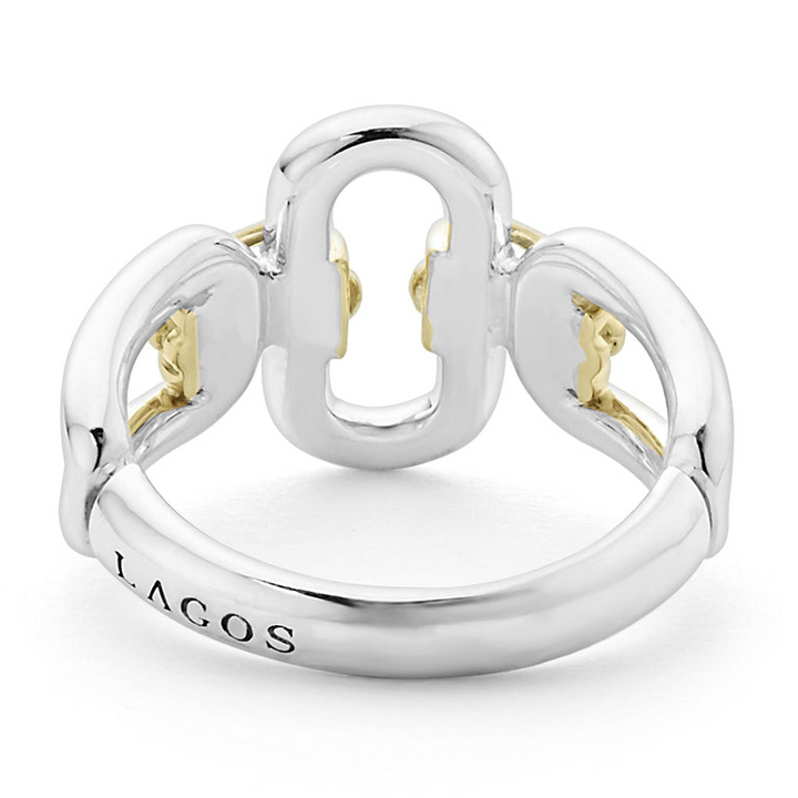 A back-view of a sterling silver and 18k gold ring displayed in the middle of a white background featuring Sterling silver and18k gold variations of Caviar beading and fluting elements