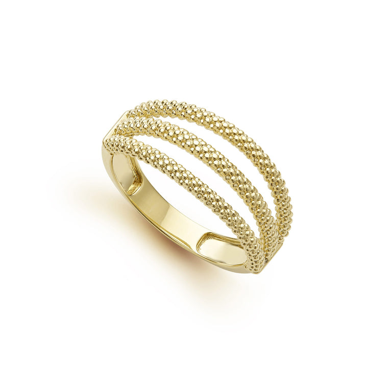 An 18K Gold ring in the middle of a white background featuring three rows with caviar beading.