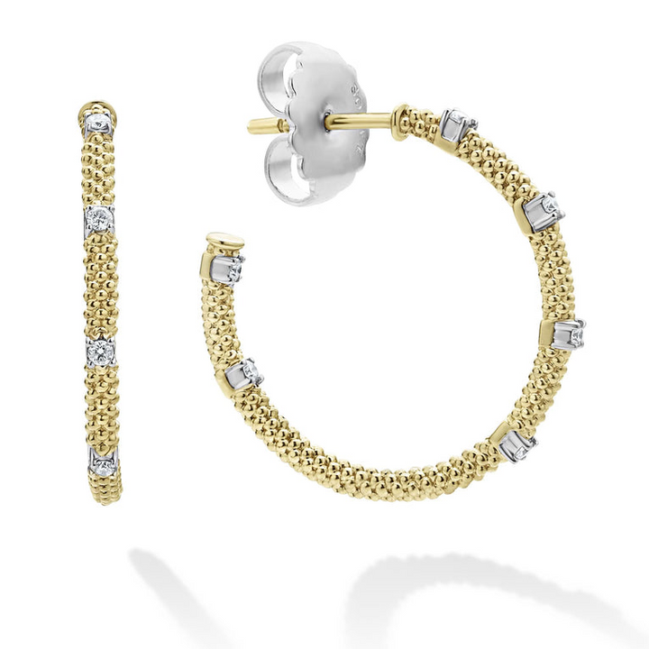 Hoop earrings with diamonds with 18k gold superfine Caviar beading. The right earring is angled, showing the back.