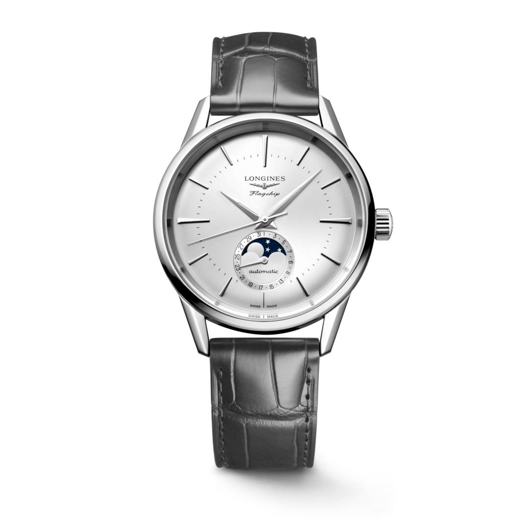 A Longines watch standing straight against a transparent background. The watch features a silver dial, silver hands and markers, a stainless steel bezel, a crown on the right side, and a black leather strap.