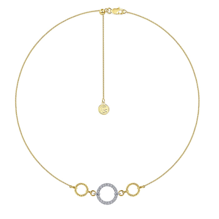 A yellow-gold Twisted Rope and Pave Diamond Circle Choker Necklace in the middle of a white background. The necklace features a mixed-metal choker with a central loop of luxe 14k white gold and dazzling 0.25ct diamonds flanked by two smaller rings of twisted 14k yellow gold.