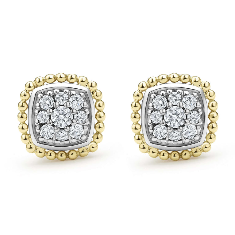 A pair of two-toned stud earrings surrounded by 18K gold Caviar beading and smooth sterling silver. 