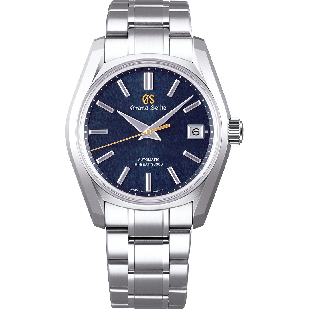 The SBGH273: Shubun watch is displayed lying flat against a transparent background. It has a blue dial, white & yellow hands and markers, and a stainless steel bracelet.