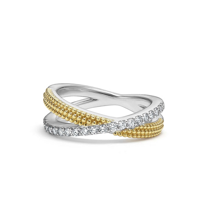 A Sterling Silver & 18K Gold ring in the middle of a white background, featuring an x motif and caviar beading