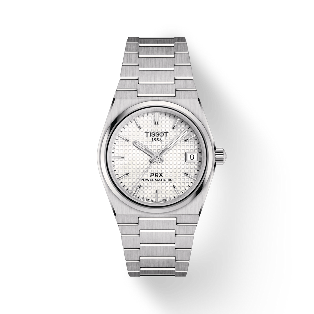 The watch features a white patterned dial, a steel bezel, silver hands and markers, and a stainless steel bracelet.