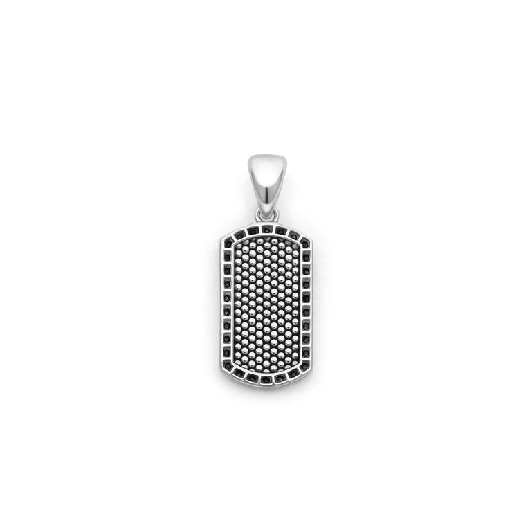 A back-view of a sterling silver amulet displayed in the middle of a white background featuring black diamonds accented by smooth silver and Caviar beading