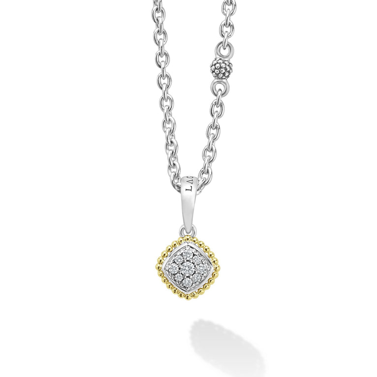 This is a close-up of a sterling silver & 18k gold necklace featuring a pavé diamond pendant necklace with 18k gold and sterling silver Caviar beading against a white background.