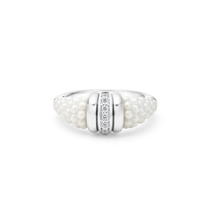 A sterling silver ring is displayed on a white background featuring white ceramic caviar beading with a row of diamonds.