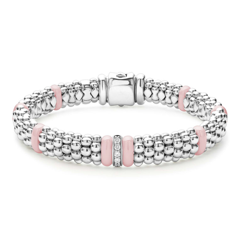 A sterling silver & 18k gold bracelet displayed in the middle of a white background, featuring pink ceramic and Caviar beading.