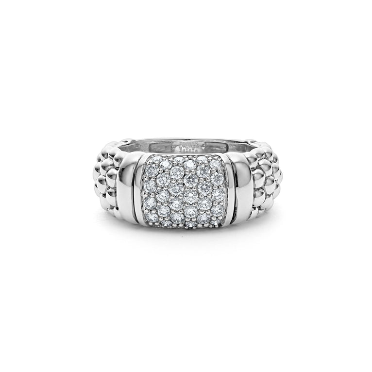 A side-view of a Sterling Silver ring featuring smooth sterling silver stations, caviar beading, and diamond-set stations.