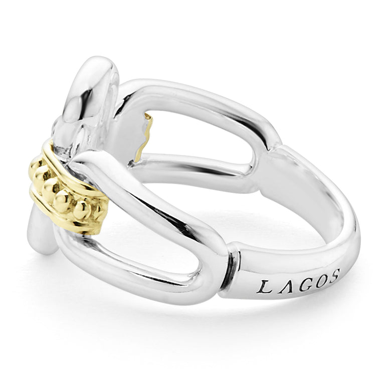 A side-view of a sterling silver and 18k gold ring displayed in the middle of a white background featuring Sterling silver and18k gold variations of Caviar beading and fluting elements