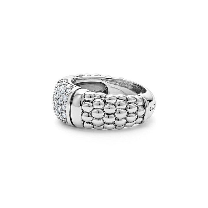 A side-view angled Sterling Silver ring featuring smooth sterling silver stations, caviar beading, and diamond-set stations.