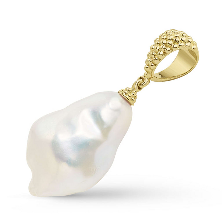 A 18k gold pendant angled to the right in the middle of a white background featuring a freshwater pearl baroque pendant  