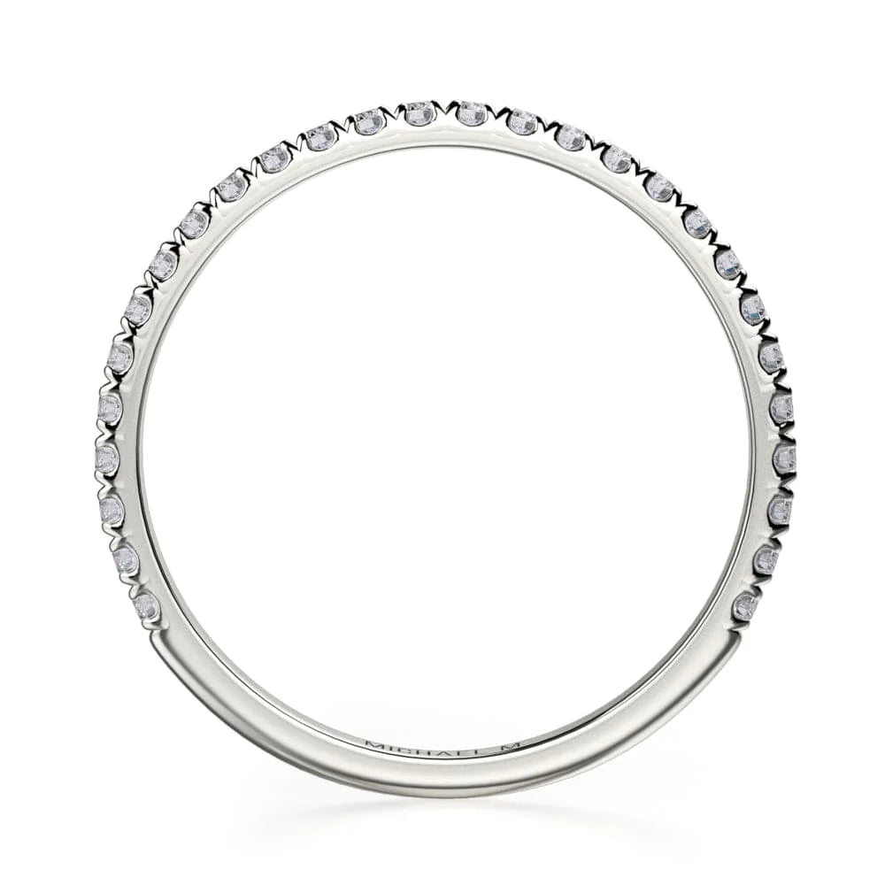 This is a side view of a white gold ring showing the outside of the ring and the white gold band.