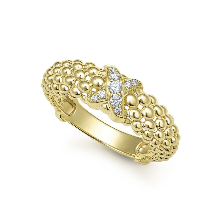 A 18K gold diamond-set x-motif ring with caviar beading