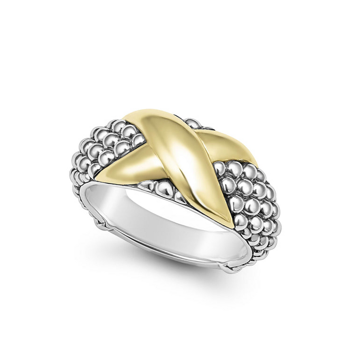 A Sterling Silver & 18K Gold ring in the middle of a white background, featuring an x motif and caviar beading