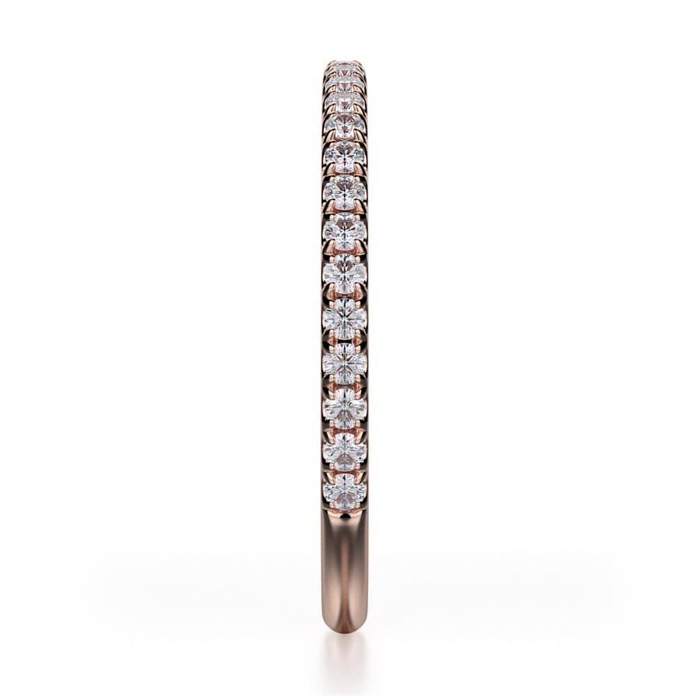 This is a close-up of the side view of the rose-gold ring. It features a bezel set of round diamonds and a rose gold band.